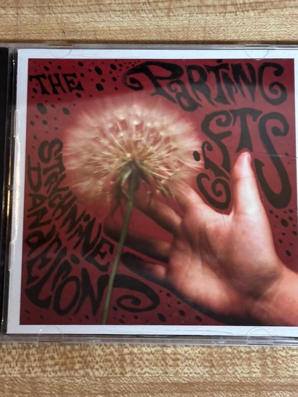 PARTING GIFTS,Strychnine Dandelion, - (Compact Disc) 2010 The Red Records